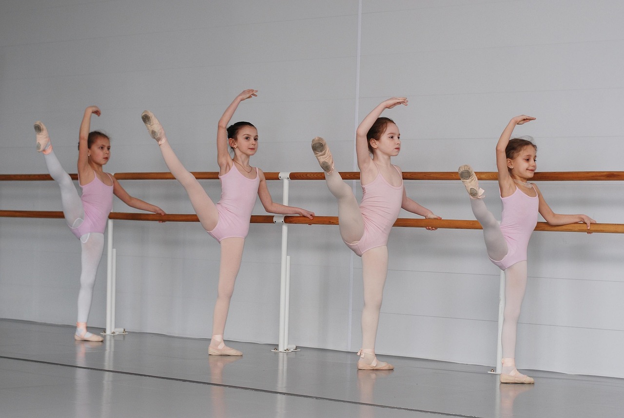 dance teacher with kids in studio