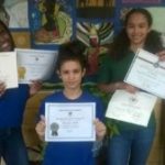 3 Dancers with their academic awards