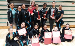 Teens and Juniors pose after receiving awards at dance competition