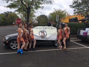 New Hope Dancers posing outside Corazones Unidos fundraiser